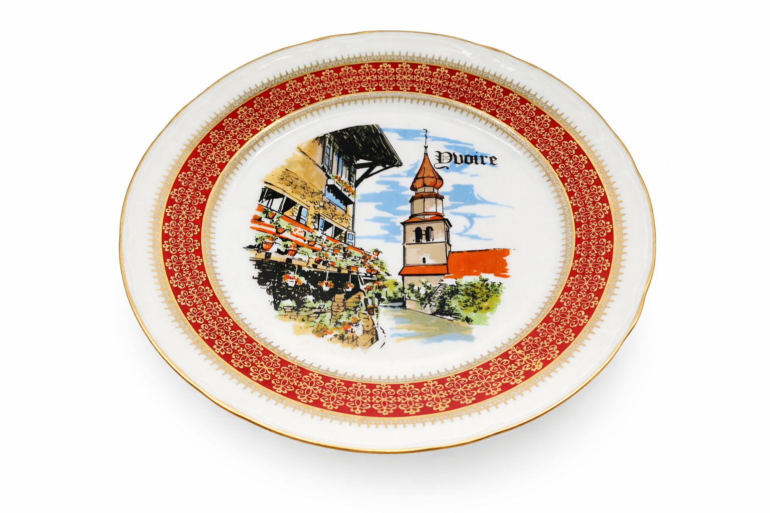 Assiette ancienne en porcelaine décor Alsacien vue en perspective, frise rouge finement dorée, décor central architectural peint, bord chantourné
