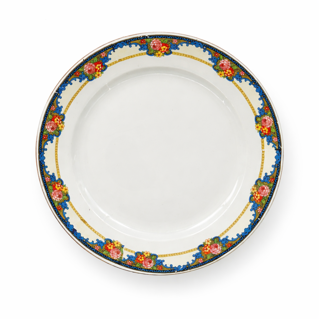 Assiette ancienne en faïence à décor floral polychrome, bordure bleue et or, production française Sarreguemines, XXe siècle